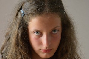 Tired and angry child.