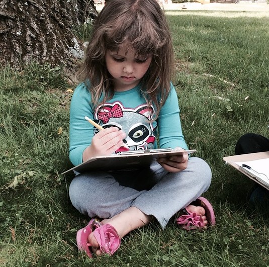 "Doing school" under a shade tree."