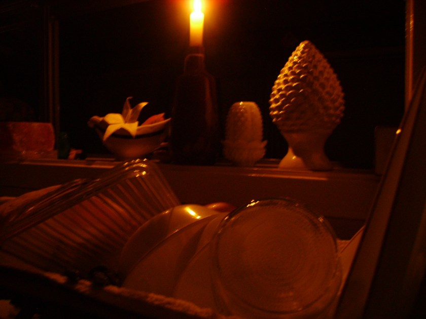 Dishes done by candlelight after Winter Storm Octavia